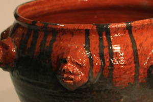 Red and Brown Pot with Faces